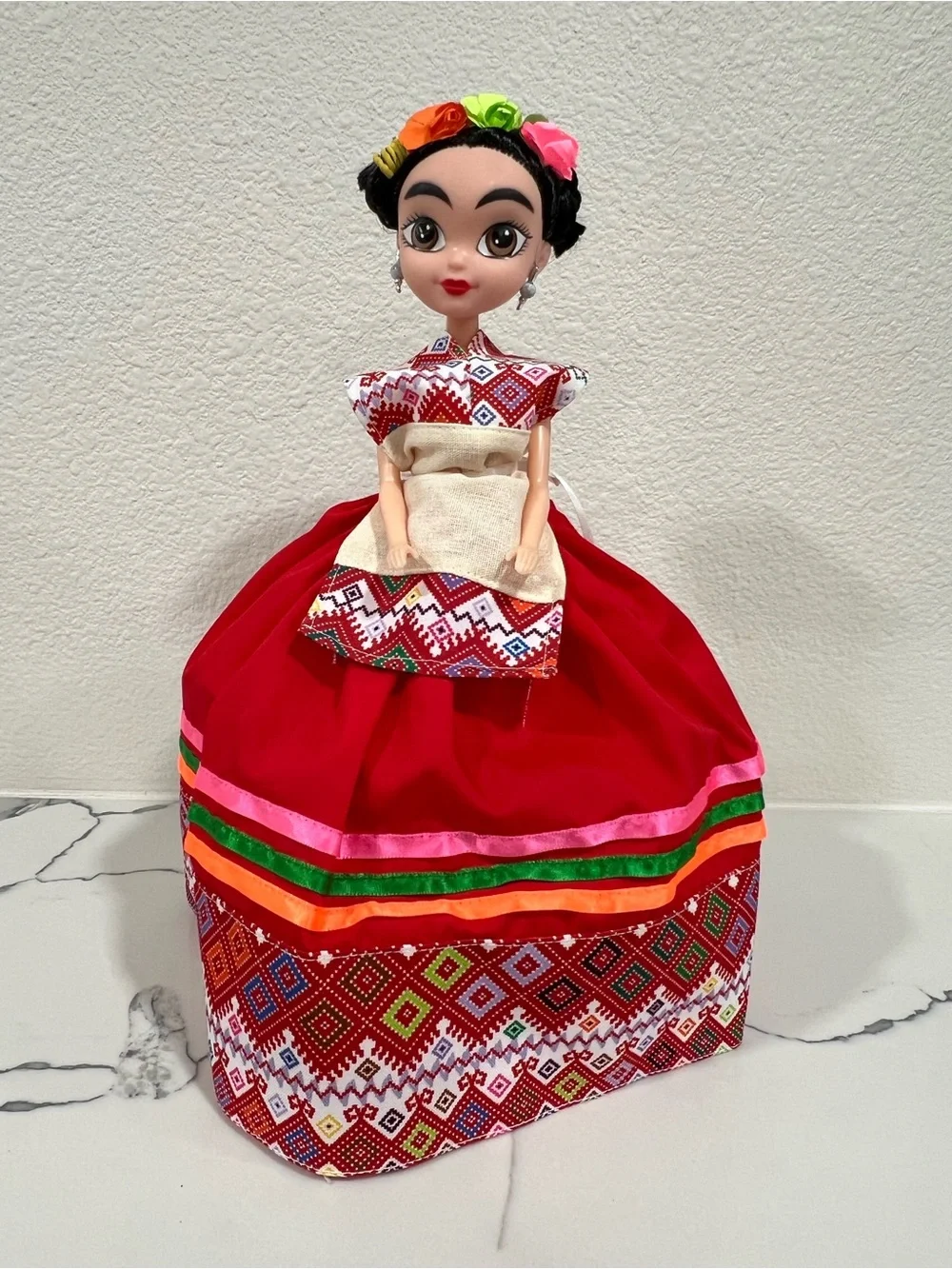 Red Traditional Folk Doll with Colorful Ribbon Accents